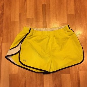 UA yellow running shorts